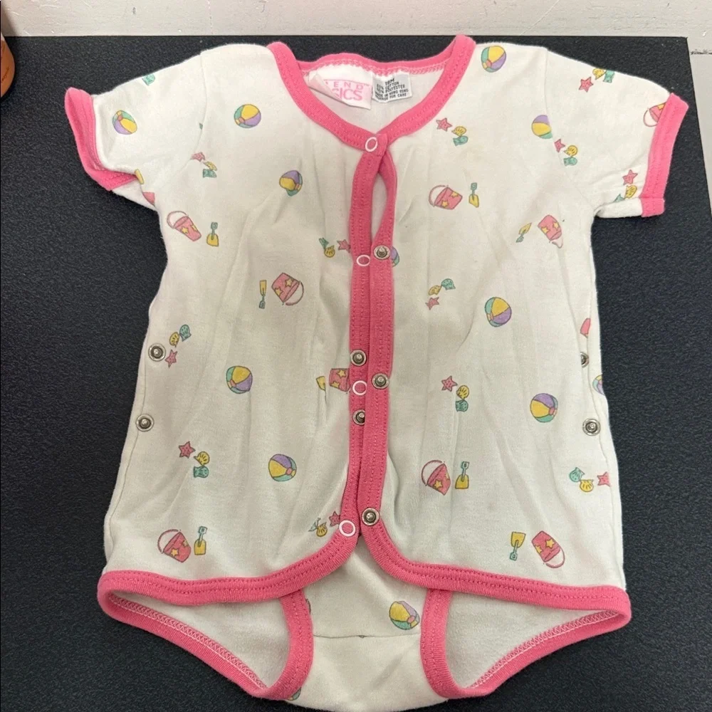 White Infant Snap Romper with Pink Trim and Beach Toy Print 90’s